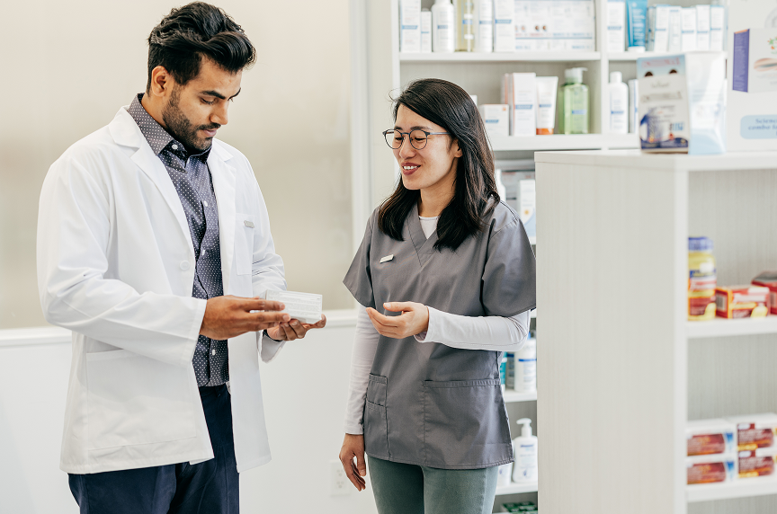A doctor and nurse talking about work