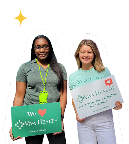 Two smiling women holding Viva Health promotional signs against a black background with stars.