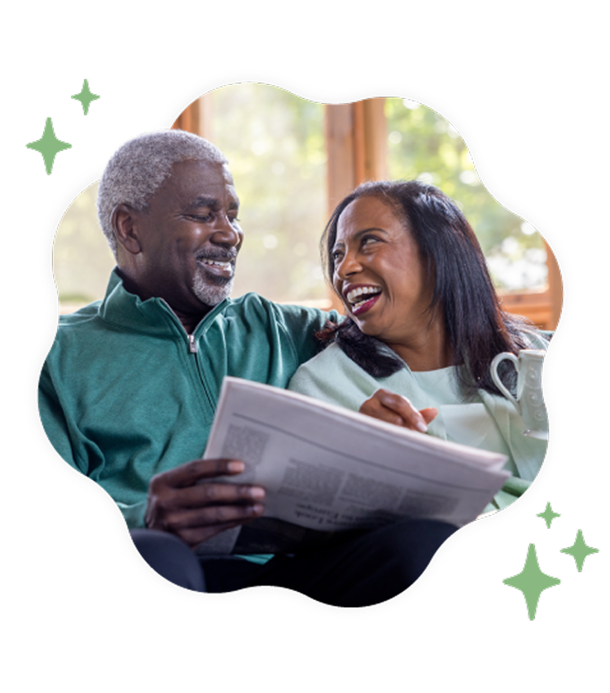 A smiling older couple looking at each other while relaxing with a newspaper and coffee, framed in a wavy shape with green stars.